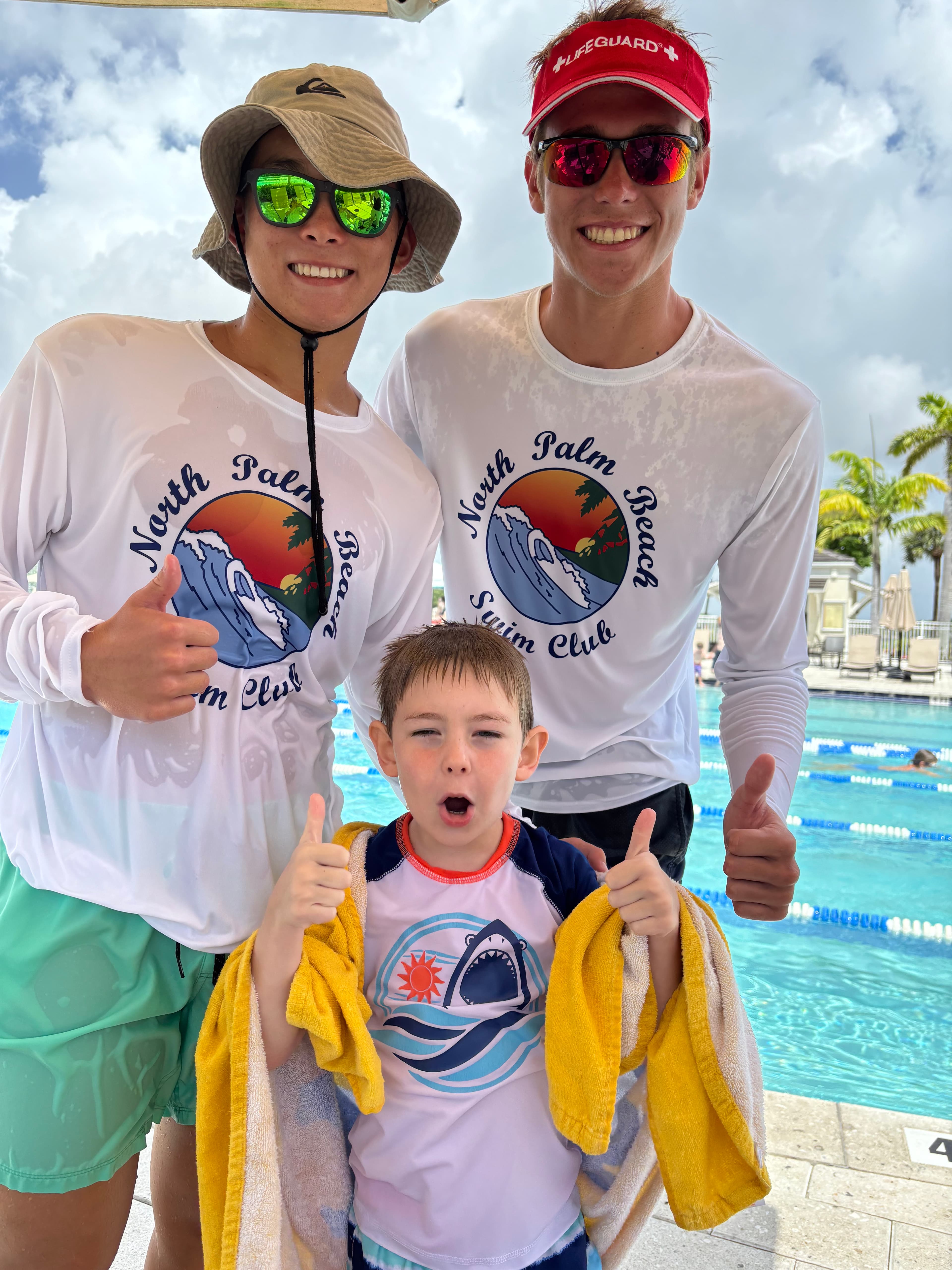 Swim for Life coaches with students by the pool